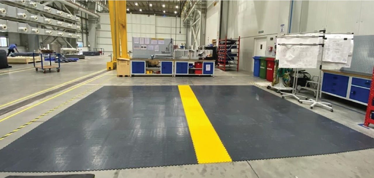 Concrete vs. PVC Interlocking Floor Tiles: Which is Better for Heavy Machinery Environments?